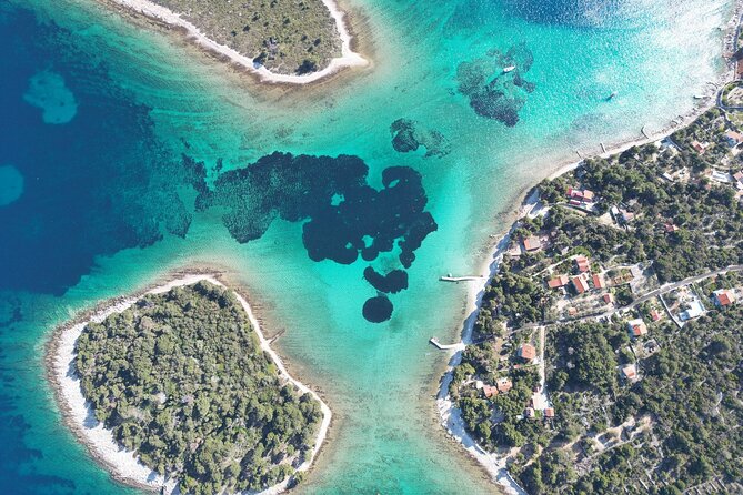 Blue Lagoon Tour from Split with Bottled Water and Wine Included - Blue Lagoon and Krknjasi Bay: one hour in clear water