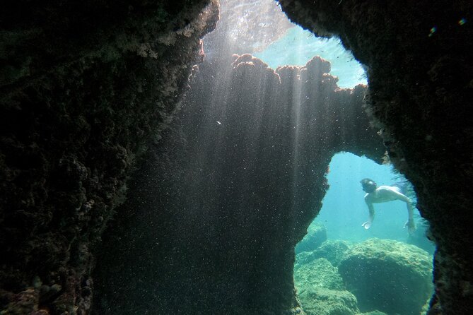Cave exploring by kayak - Snorkeling, cliff views, and time in the water