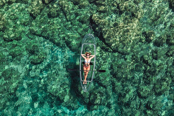 Clear Kayak Tour to Canyon, Island Cliffs & small Cave - What the guide adds to the experience