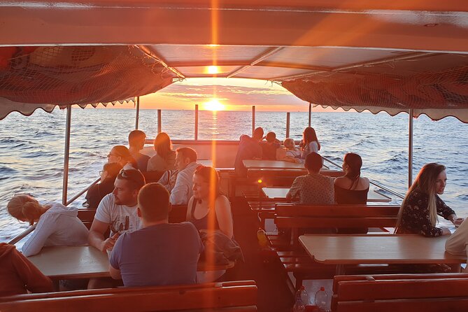 Dolphin Watching Sunset Boat Trip in Pula with Dinner - Key points to know before booking