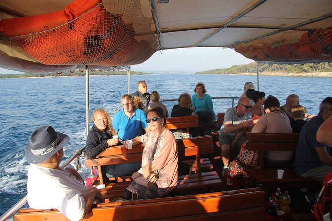 Dolphin Watching Sunset Boat Trip in Pula with Dinner - What the group size means on the water