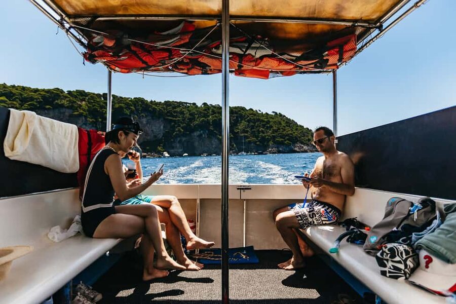 Dubrovnik: Blue Cave and Elafit Small Group Boat Exploration - Drinks, music, and the boat ride back
