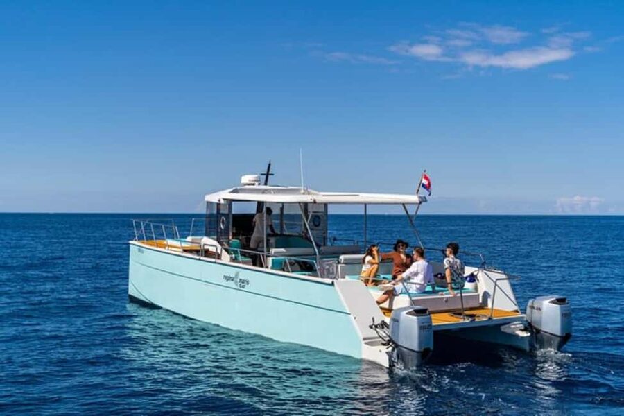Dubrovnik: Blue Cave Catamaran Tour with Drinks and Snorkel - Blue Cave light and cold Adriatic water
