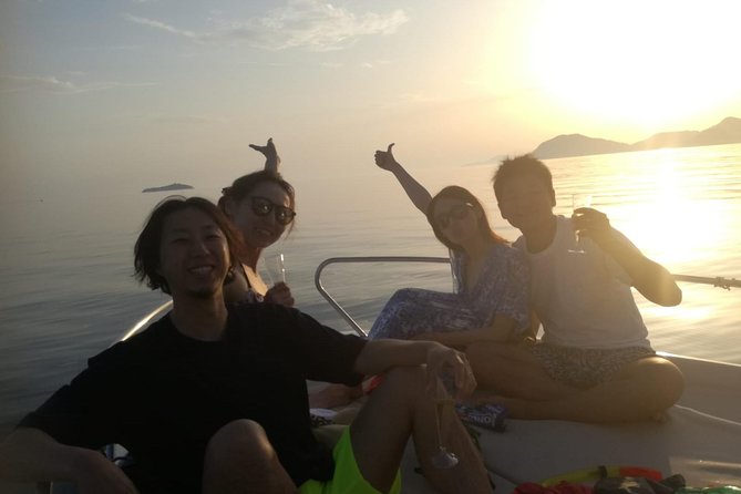 Dubrovnik: Golden Hour Sunset Cruise with Drinks - Captain Marko and the group atmosphere