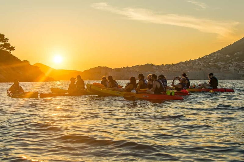 Dubrovnik: Guided Sunset Sea Kayaking with Snacks and Wine - Returning under the walls with photo stops