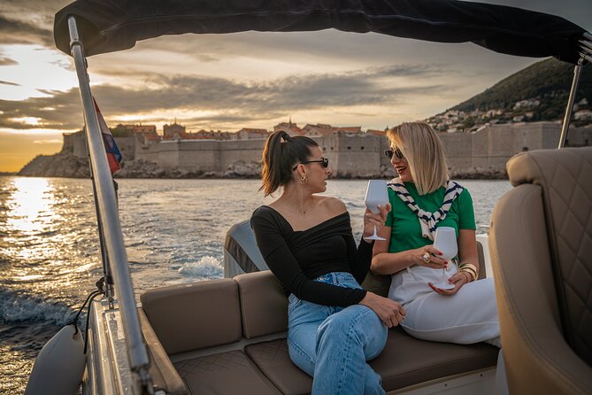 Dubrovnik Sunset Tour By Boat With Local - Seeing the city walls from sea level