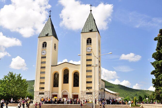 Dubrovnik to Medjugorje & Kravice - Day Trip with Luxury Vehicle - Kravice Falls and the emerald-green lake
