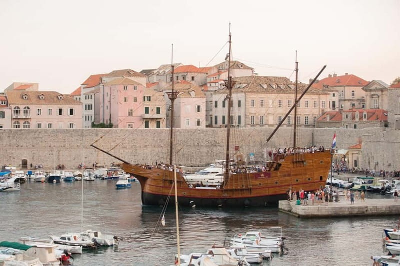 Dubrovnik walking tour and cruise on Karaka ship - Entering Dubrovnik’s Old Town by the old port