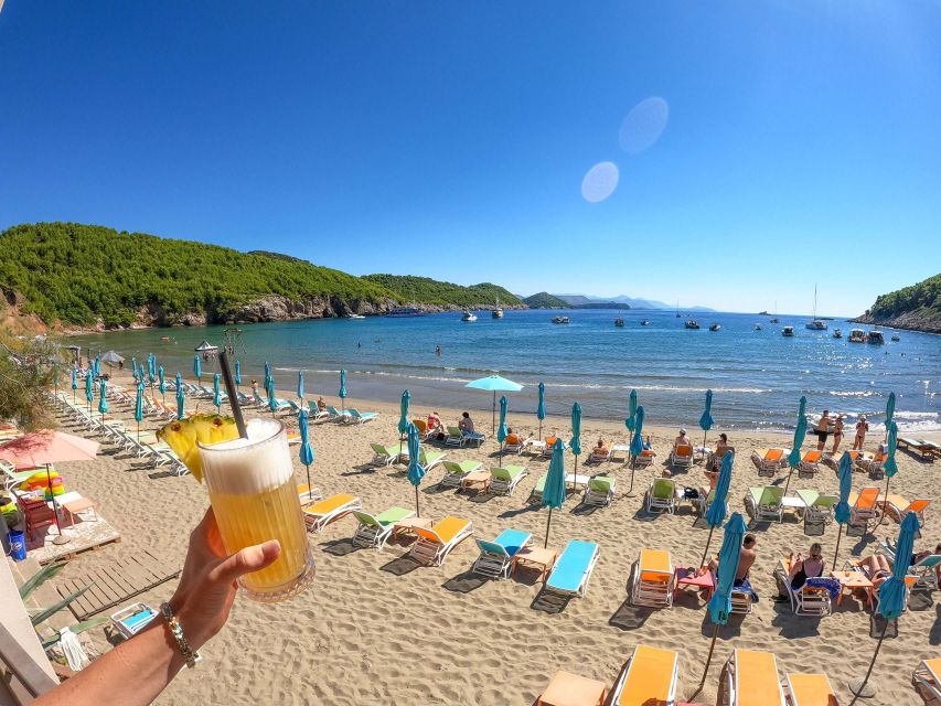 From Dubrovnik/Cavtat: Blue Cave, Sunj Beach Speed Boat Tour - Drinks, music, and the tone on board