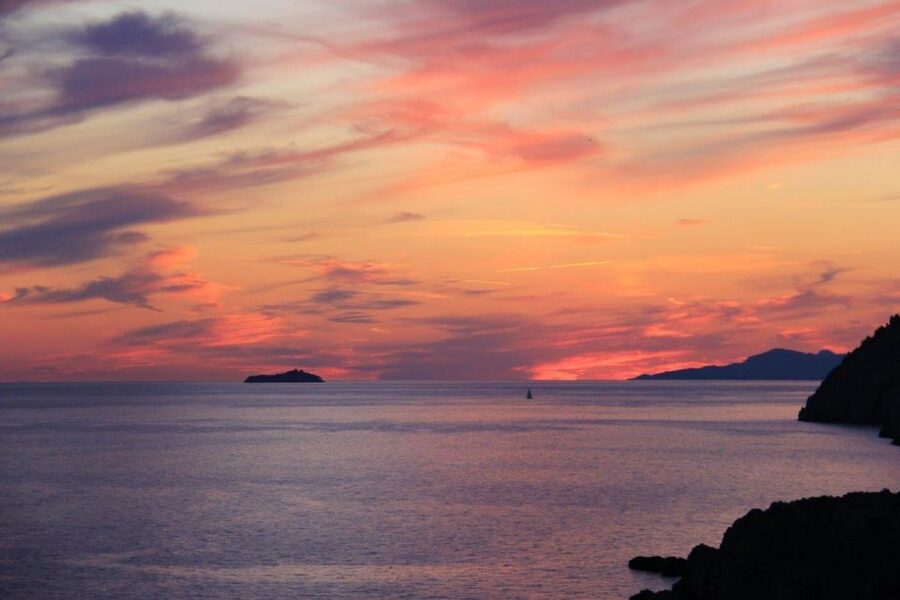From Dubrovnik: Golden Hour Sunset Cruise with Free Drinks - Passing Dubrovnik’s walls from the seaside