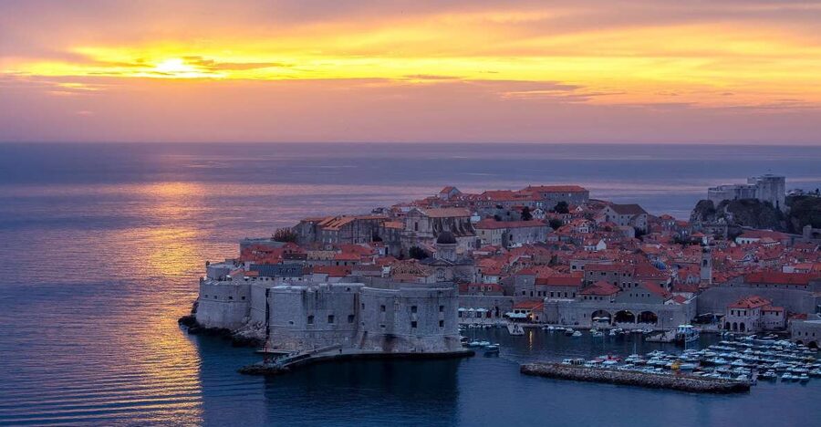 From Dubrovnik: Golden Hour Sunset Cruise with Free Drinks - Finding the boat beside Lokanda restaurant