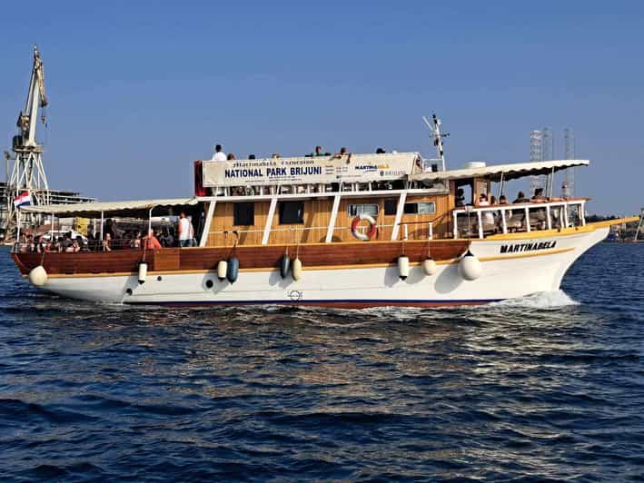 From Fazana: Dolphin watching sightseeing cruise at sunset - Watching dolphins without chasing them