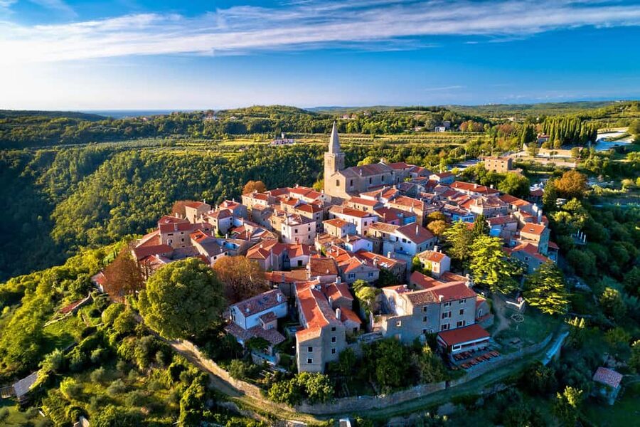 From Rovinj: Istria Day Tour to Poreč, Grožnjan & Motovun - Poreč: Roman streets, waterfront air, and golden mosaics