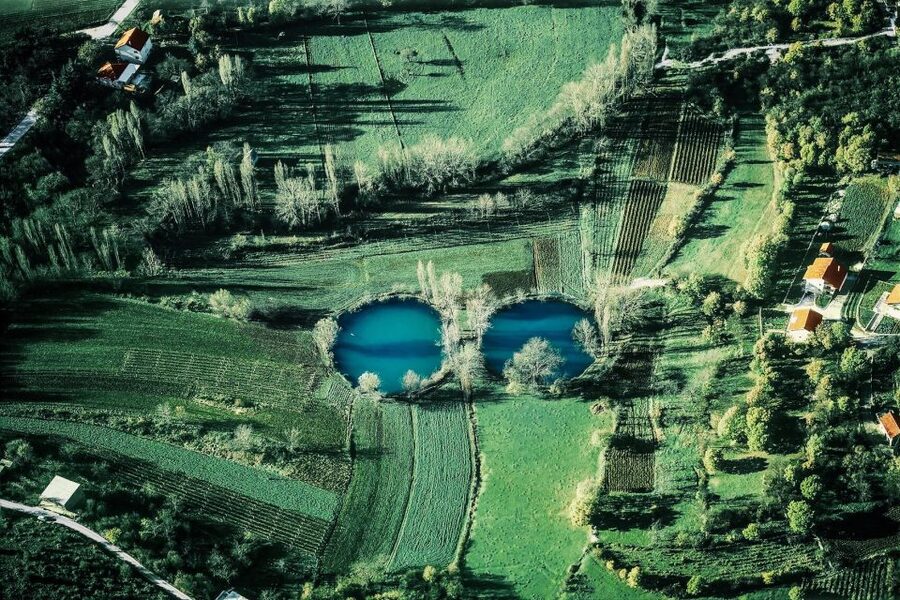 From Sinj: Flight Over Imotski, Trilj, Omiš, and Split - Looking down on Imotski and its crater lakes