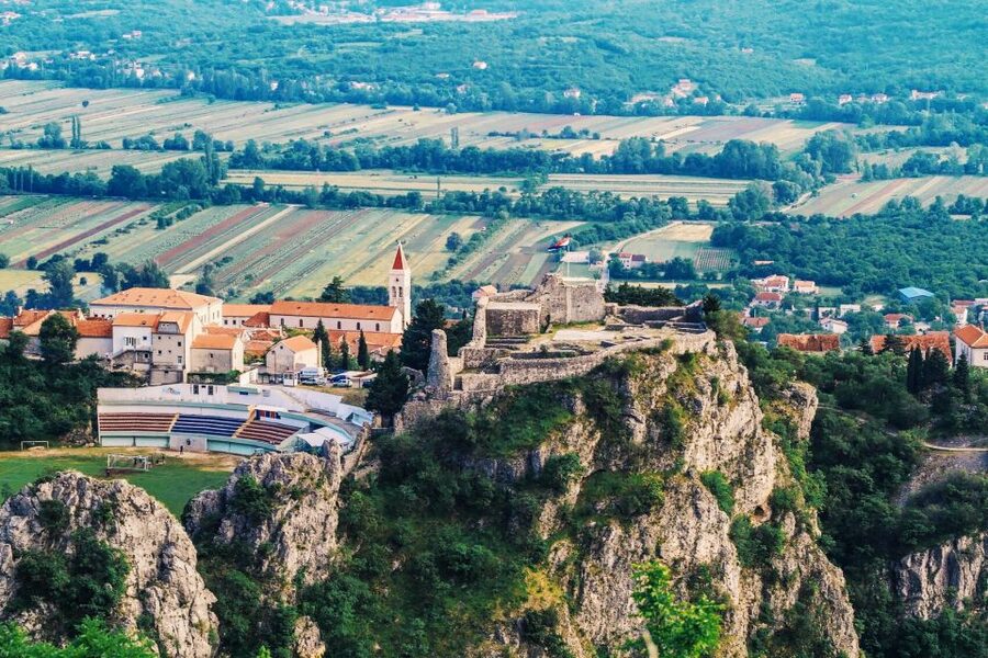 From Sinj: Flight Over Imotski, Trilj, Omiš, and Split - Following the coast toward Split