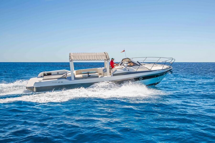 From Split: Blue Cave & 5 Islands with Vis & Hvar Boat Tour - Komiža, where fishing life meets film history
