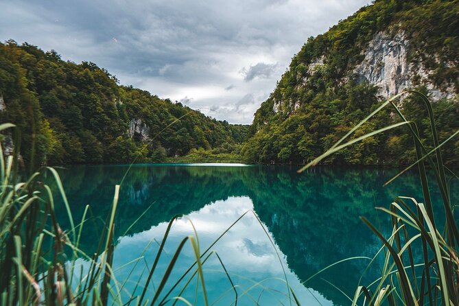 From Split: Plitvice Lakes National Park Guided Tour - Caves, travertine, and the park’s living geology
