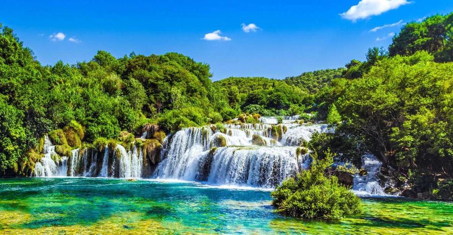 From Split & Trogir: Krka Waterfalls Day Tour with Boat Ride - An hour and a half in Skradin