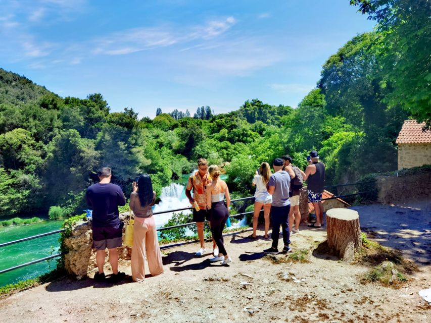 From Split & Trogir: Krka Waterfalls Day Tour with Boat Ride - Walking through Skradinski Buk