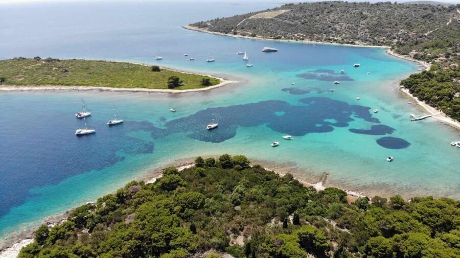 From Trogir: 3 islands half day tour with Blue Lagoon - Krknjaši Blue Lagoon: the main swimming stop