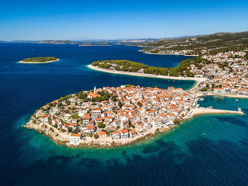 From Trogir, Seget & Okrug: Krka Waterfalls Culture Tour - Drivers, Audio Guides, and Group Size