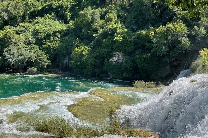 From Zadar Day Tour, Krka Waterfalls, Skradin Cruise, Swimming - Entering Krka by boat
