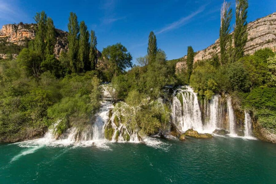 From Zadar: Krka Waterfalls Tour with Panoramic Boat Ride - The panoramic boat ride through the park