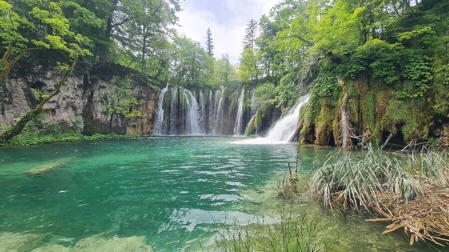 From Zadar: Plitvice Lakes Guided Tour with Boat & Train - What the $53 price really covers