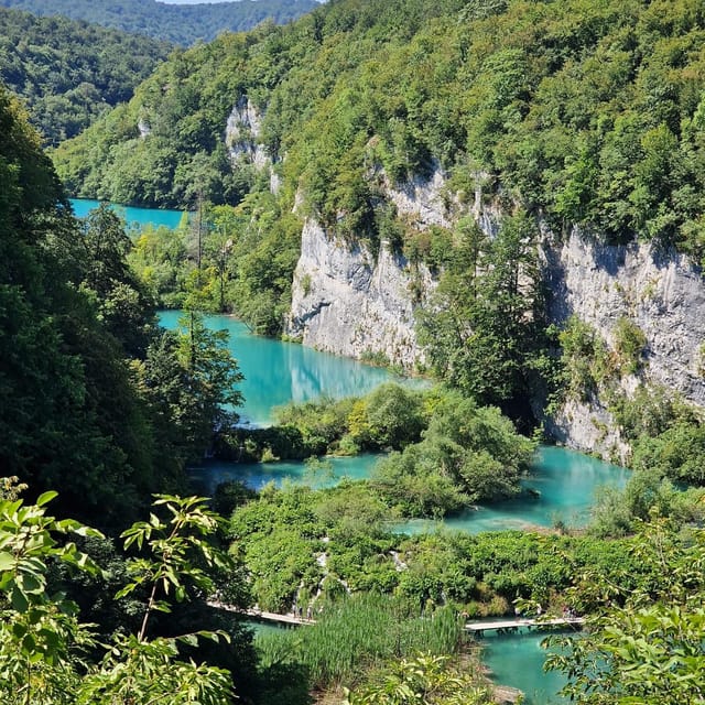 From Zadar: Plitvice Lakes Guided Tour with Boat & Train - Meeting in Zadar at 7:15 or 7:30