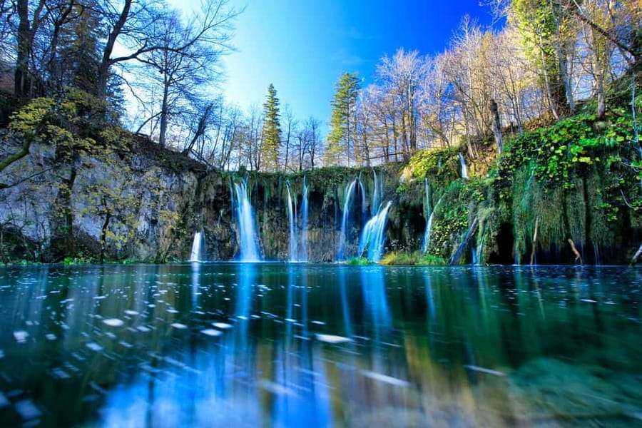 From Zadar: Plitvice Lakes National Park Day Trip +Boat Ride - Entering the park through a separate entrance