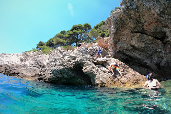 Half-Day Best Beaches & Bays Private Speed Boat Tour - Skippers Tom and Ivan shape the day