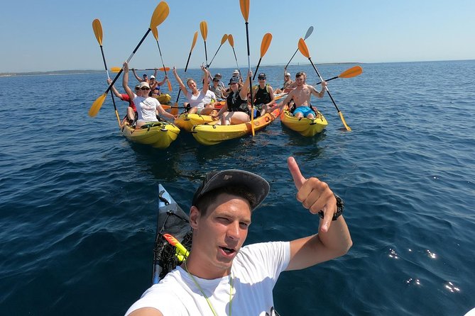 Kayak tour with cave experience - Rock walking, swimming, and cliff jumping