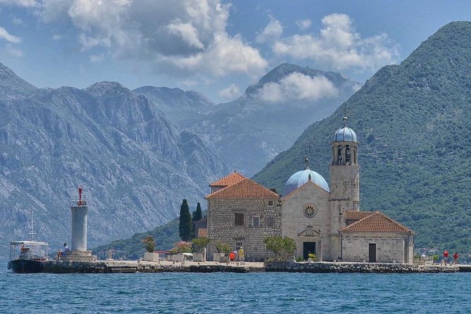 Kotor Bay Day Trip from Dubrovnik with Boat Ride to Lady of the Rock - Crossing into Montenegro and following the bay