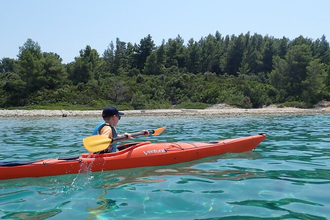 Lumbarda-Sunset Kayaking Experience with picnic: Wine and Sweets - Badija, a monastery, and wild deer