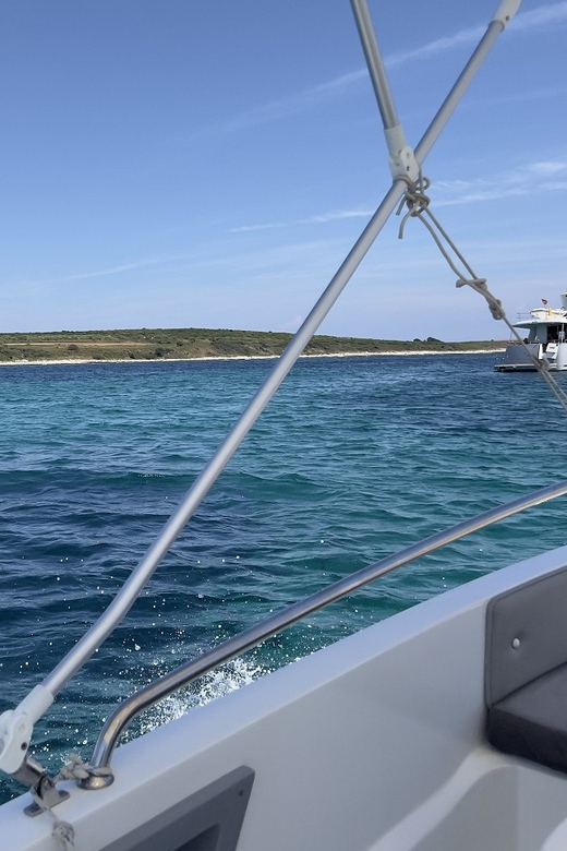Medulin: Morning on Speedboat with Cave & Island Snorkeling - The Porer Lighthouse on Its Rocky Islet