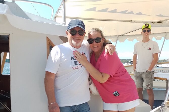 NP Brijuni Island Swimming & Dolphin Watching Sunset Cruise - Sunset, harbor lights, and the return to Pula