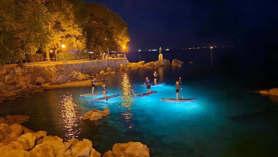 Opatija: Guided SUP Paddleboarding Adventure at Night - Entering the bay under Opatija’s evening lights
