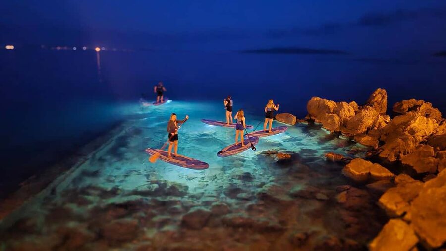 Opatija: Guided SUP Paddleboarding Adventure at Night - Learning the basics before sunset fades
