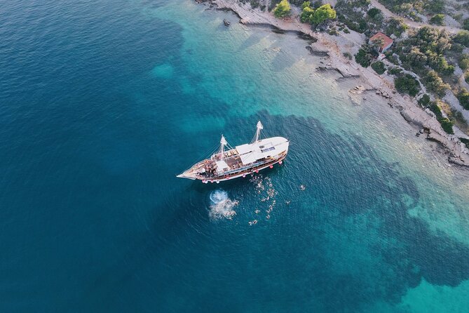 Out to Sea Split Boat Party w/ Blue Lagoon Swim, Dj & Afterparty - Drinks, food, WiFi, and the practical extras
