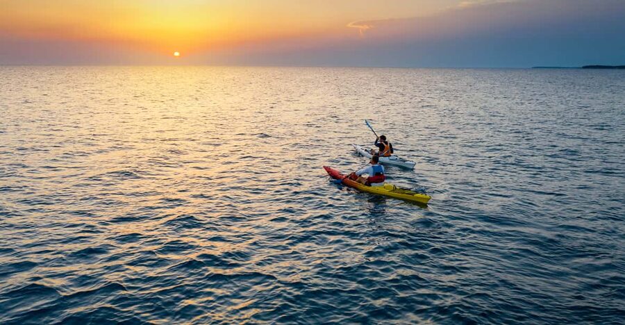 Poreč: Sea Kayaking Sunset Tour - Watching the sun drop from the open water