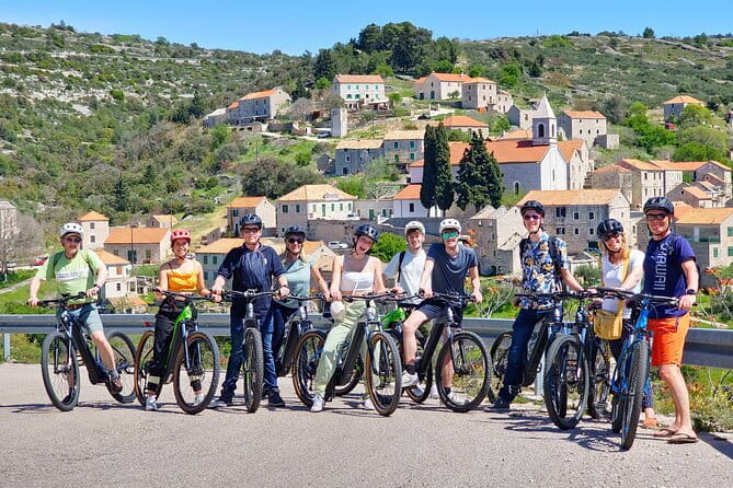 Private Custom Island Hopping Speedboat Tour from Hvar - Stiniva Cove behind high stone walls