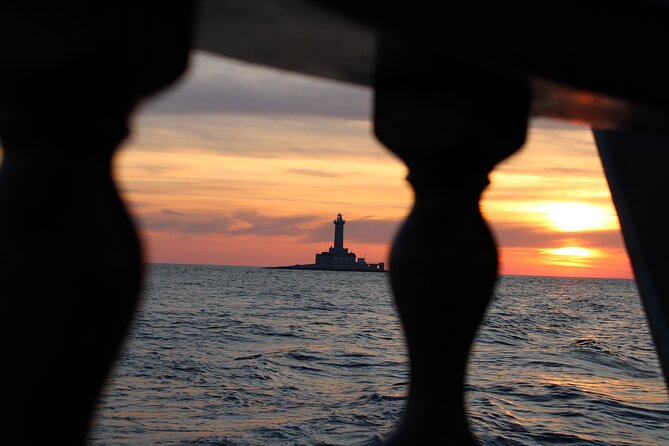 Private Sunset Dolphin Excursion with Dinner and Animation - Kamenjak Bay at sunset