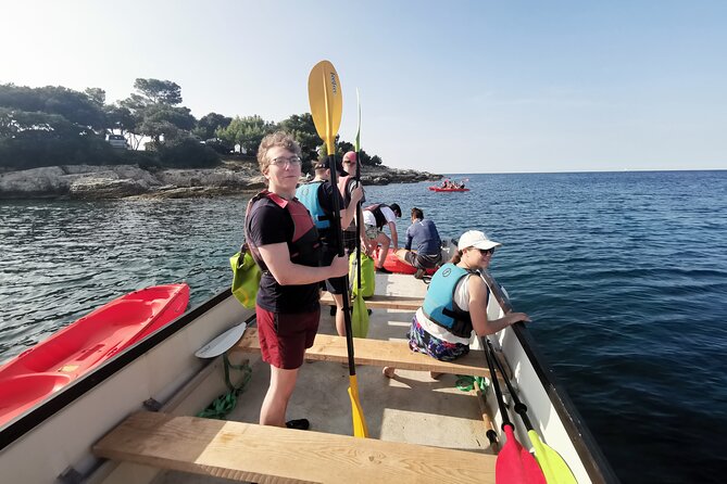 Pula Boat & Kayak Adventure - Exploring the sea cave by kayak
