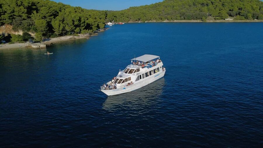Pula: Brijuni National Park Dolphin Watching Tour w/Dinner - Setting sail from Pula beside the yellow police building