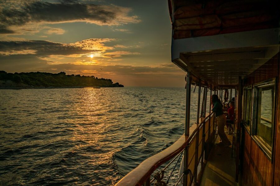 Pula: Brijuni National Park Sunset, Dolphins & Dinner Cruise - Sunset over the Brijuni coast