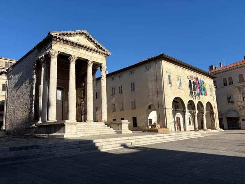 Pula by E-Bike: Roman Ruins, Sea Views & Hidden Gems - The Roman center: Amphitheatre, Forum, and Temple of Augustus