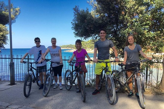 Pula Highlights Bike Adventure - Cycling past Pula’s old town and working waterfront