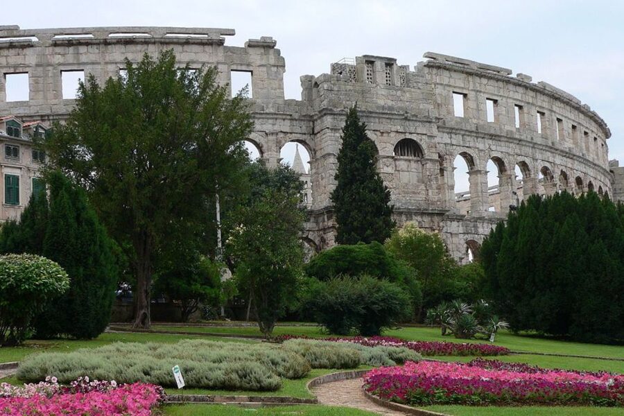 Pula: Historic Walking Tour with Local Guide & City Views - Reading Forum square through Roman and Venetian layers