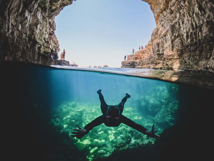 Pula: Kayaking,Snorkeling, Cliff jumping Tour with Wetsuit - Beer, water, and the end of the paddle