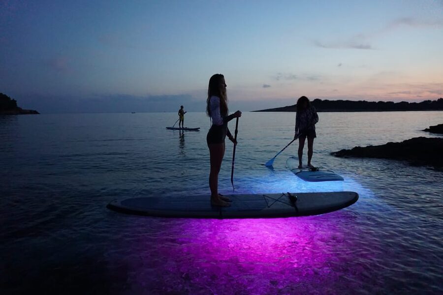 Pula: Night LED Stand-Up Paddle Board Tour - Looking through the LED glow